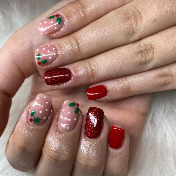 Festive Nail Design with Playful Patterns and Glittering Holiday Accents.