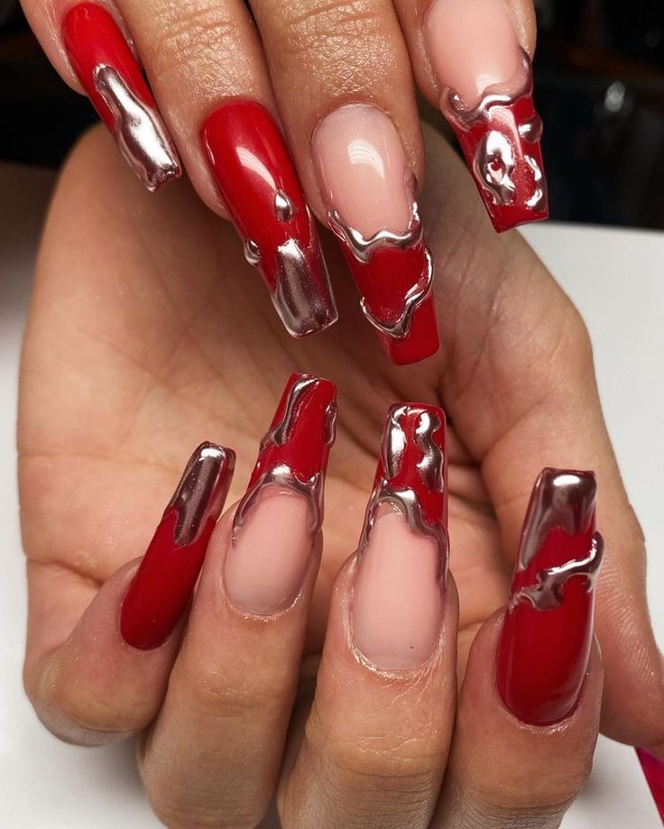 Dramatic Red and Metallic Nail Design for a Bold Statement.