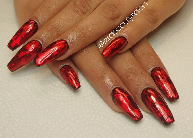 Glamorous High-Gloss Red Almond-Shaped Nail Design