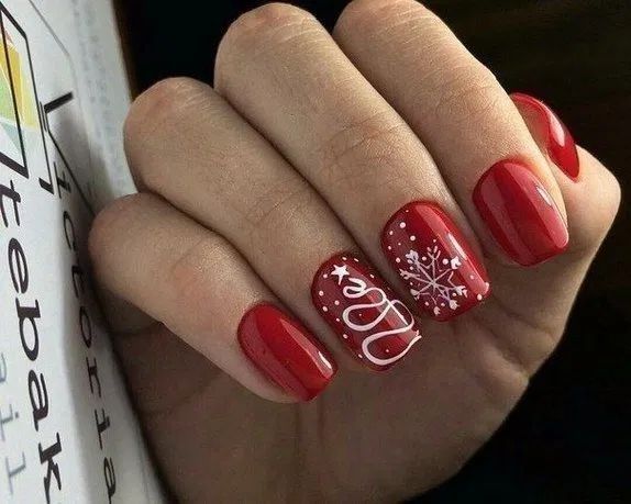 Elegant Festive Red Nail Design with Glossy Finish and Holiday Accents