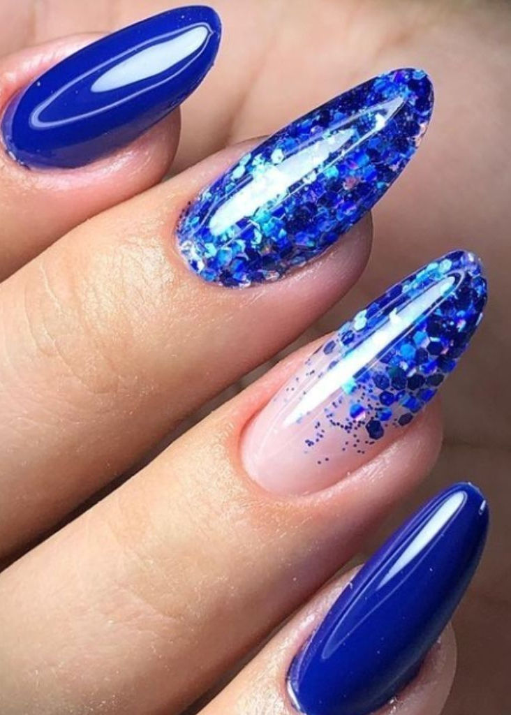 Chic Striking Blue Nail Design: A Glamorous Blend of Matte, Glossy, and Glitter Accents