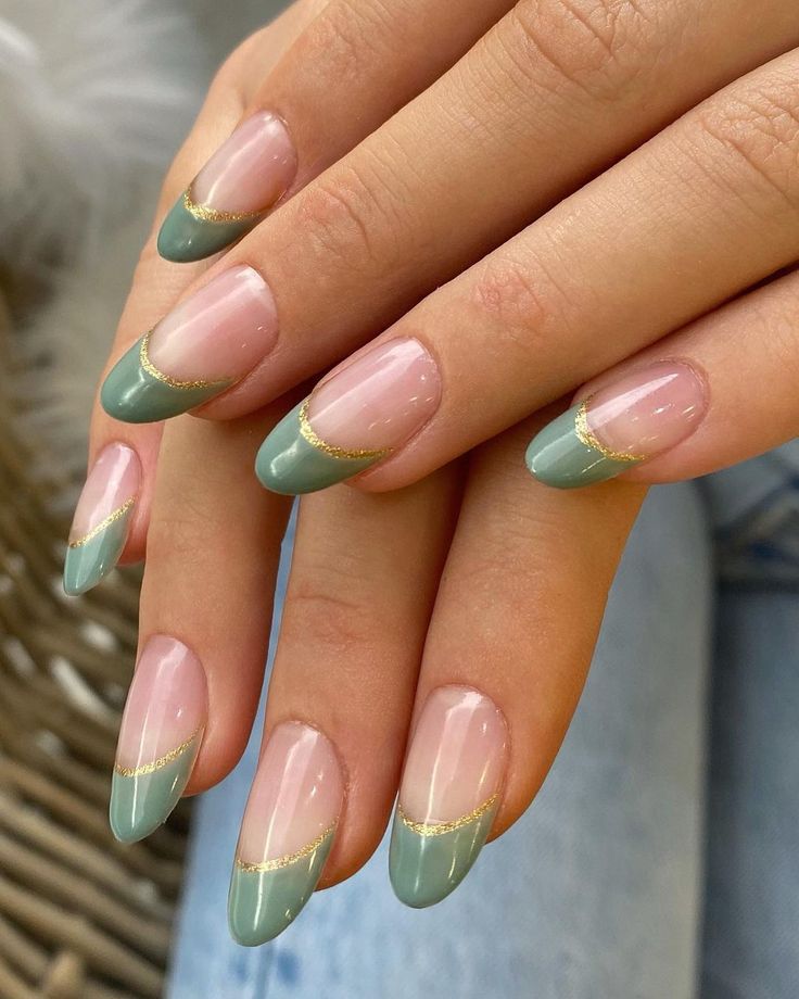 Sophisticated Nail Design: Soft Pink and Muted Green French Tips with Gold Accents