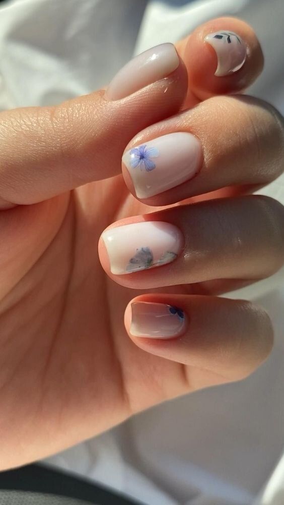 Elegant Floral Pastel Nude Nail Design for a Chic Look.