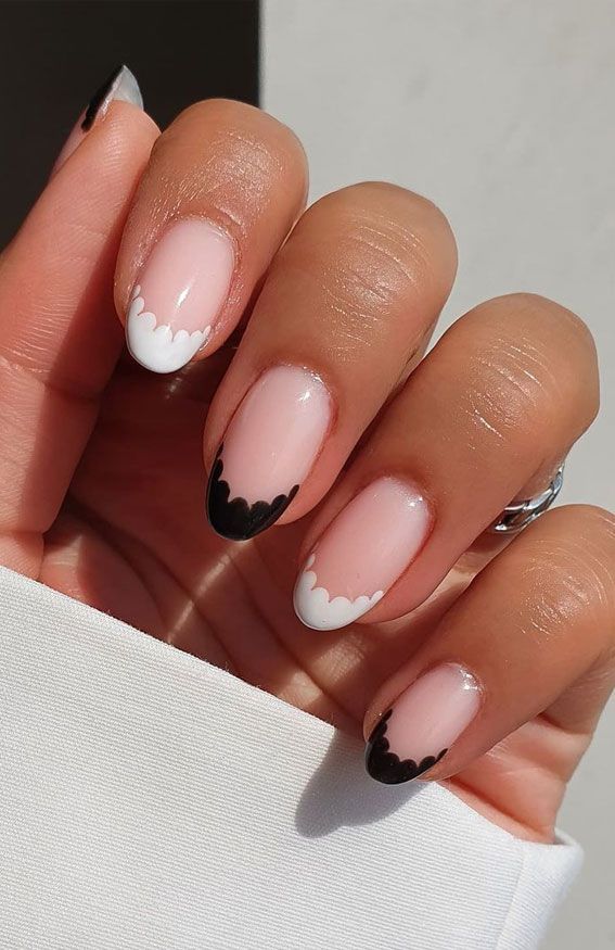 Playful Chic Nail Design with Soft Pink Base and Wavy Scallop Tips.