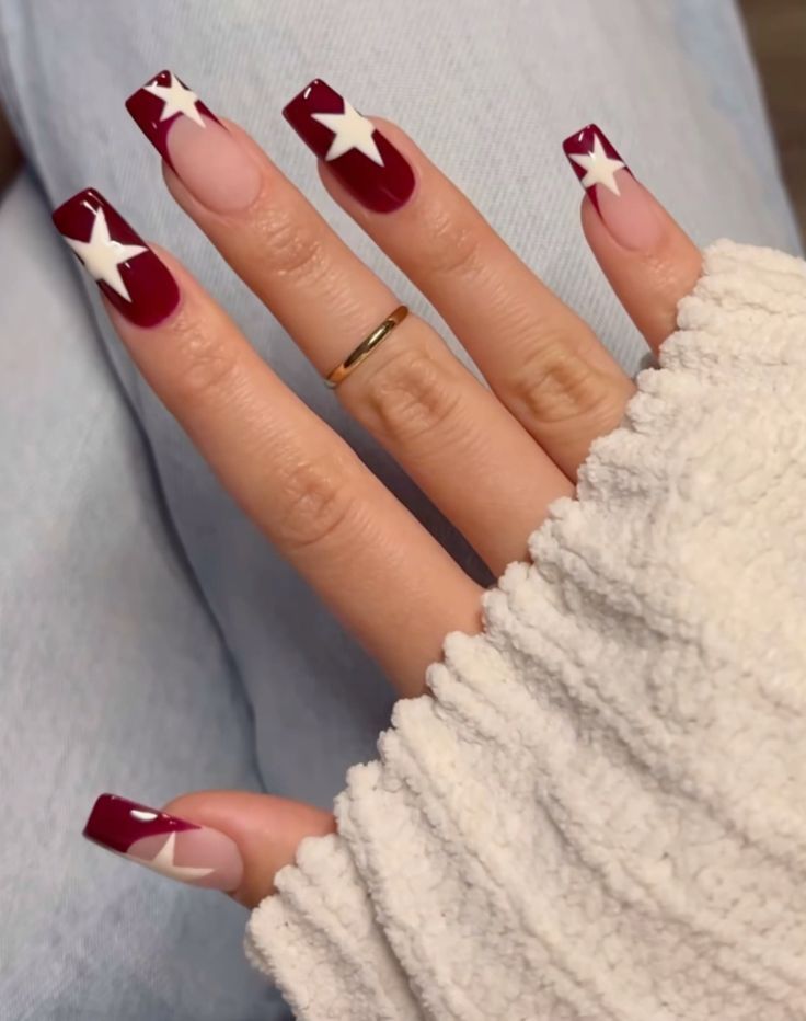 Chic Burgundy Nail Design with White Stars and Contemporary Square Tips.