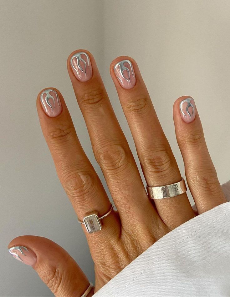 Elegant Abstract Nail Art: Soft Silver Waves on a Nude Base