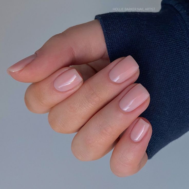 Elegant Glossy Nude Nail Design for a Polished Minimalist Look.