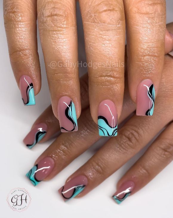 Sophisticated Pastel Pink and Mint Green Nail Design with Artistic Swirls and Glossy Finish.