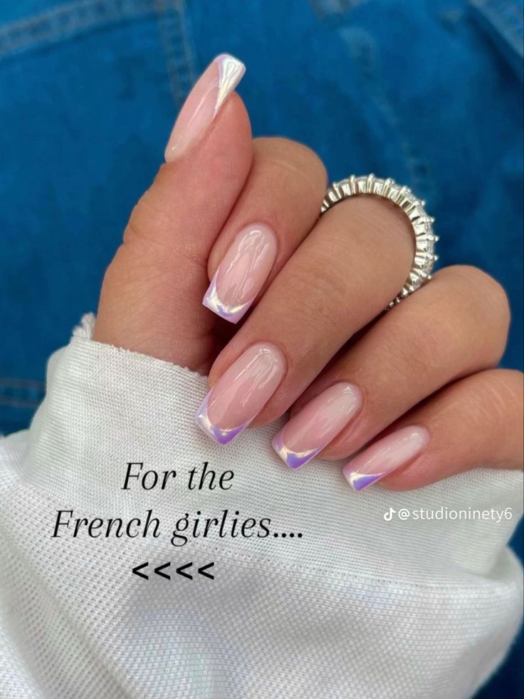 Chic Modern French Manicure with Soft Nude Base and Pastel Tips.