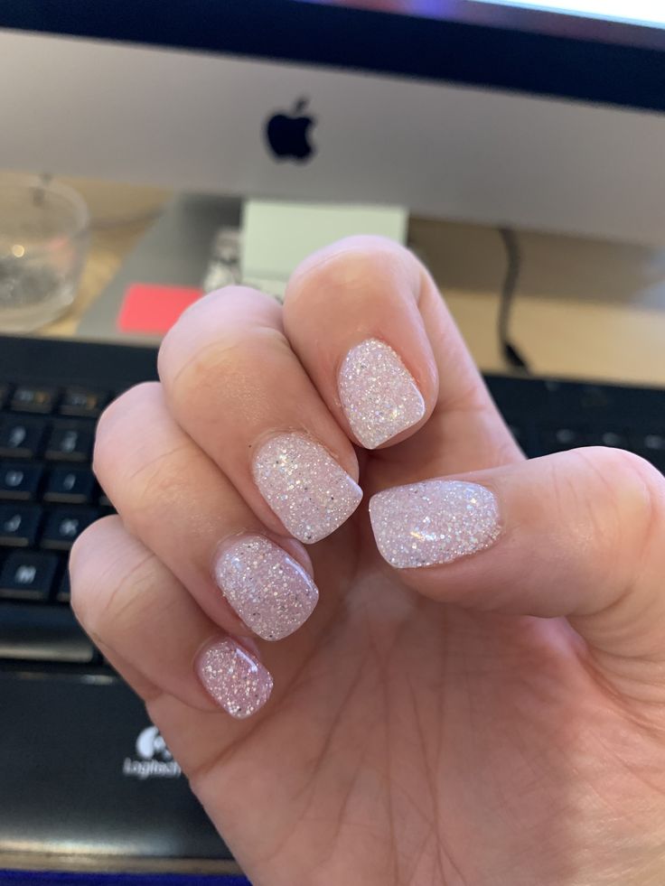 Elegant Pastel Pink Glitter Nail Design for Any Occasion