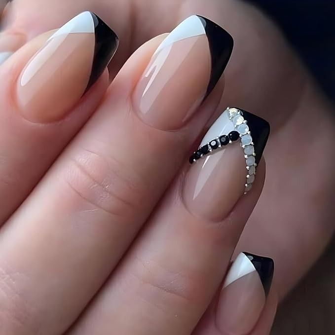 Elegant Chic Nail Design: Minimalist French Tips with Glossy Black Edges and Glamorous Stone Accents.