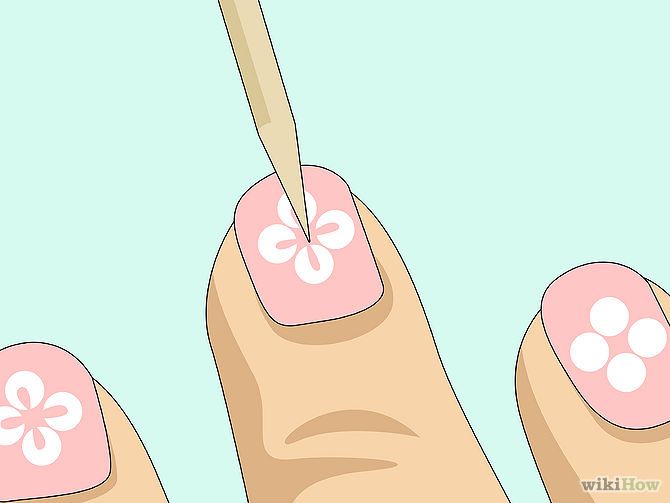 Delicate Floral Nail Design: Soft Pink Base with White Flower Patterns