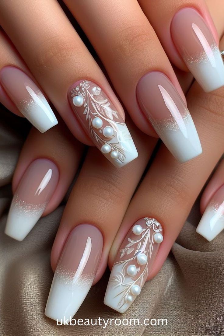 Sophisticated Gradient Nail Design with Floral Patterns and Pearls for Special Occasions.