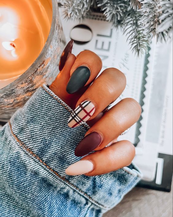 Chic Multi-Colored Nail Design with Trendy Plaid Accent