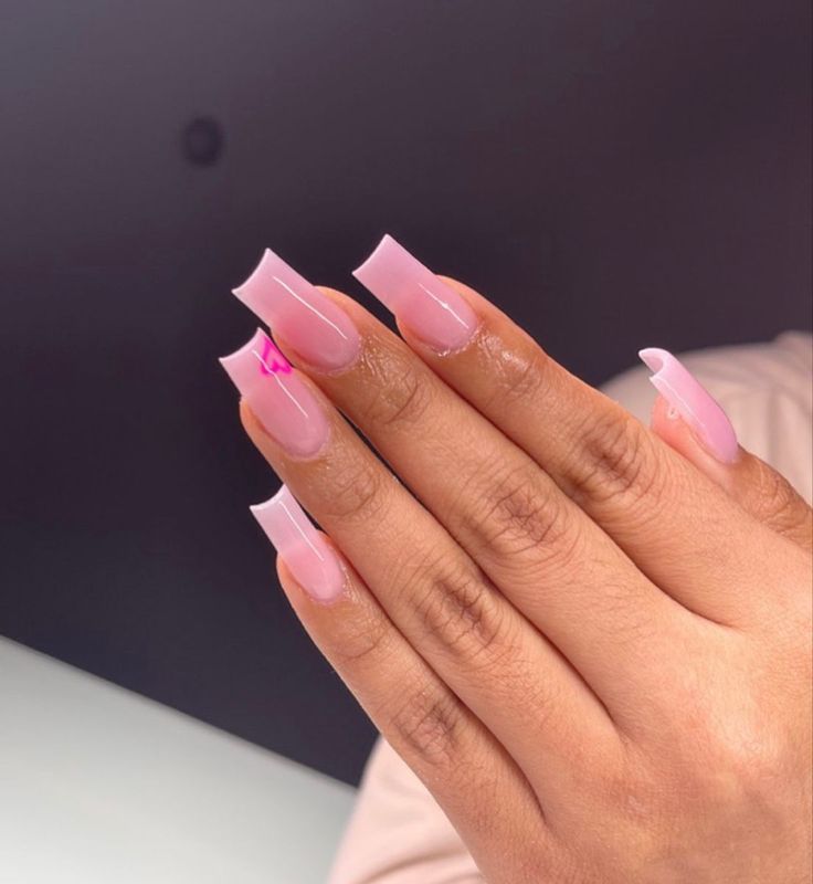 Elegant Soft Pink Gradient Long Nails: A Chic and Creative Design for Any Occasion.