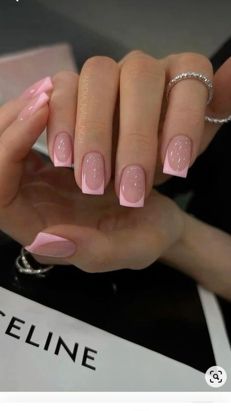 Sophisticated Soft Nude and Light Pink Tip Nail Design with Glitter Shine.