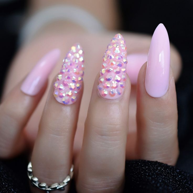 Elegant Soft Pink Nail Design with Glossy/Textured Finishes and Rhinestone Accents