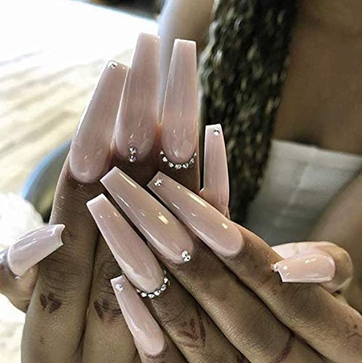 Glamorous Soft Pink Acrylic Nails with Glossy Finish and Rhinestone Accents