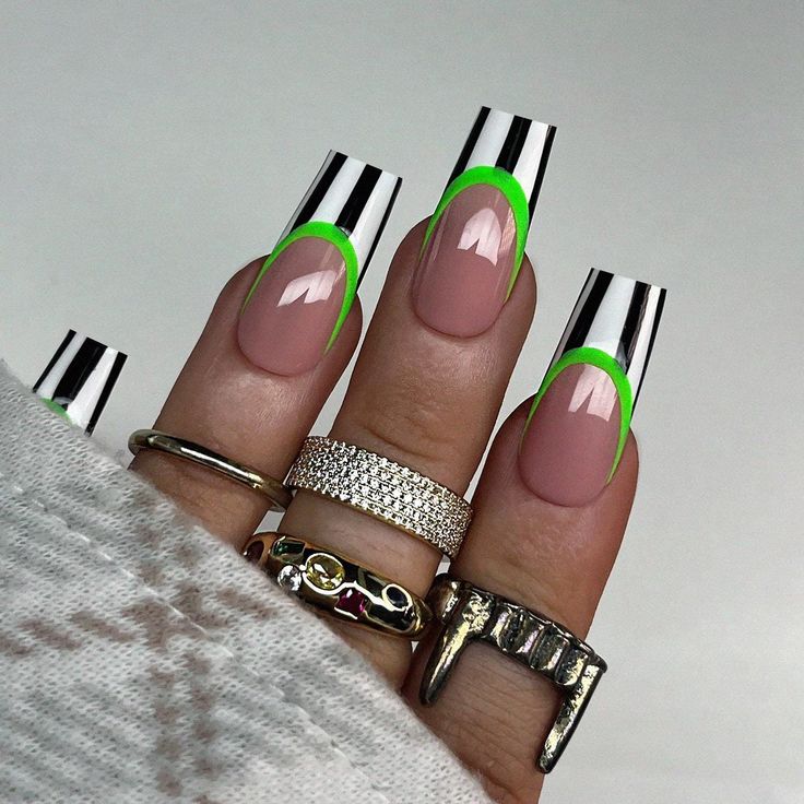 Modern Elegant Nail Design with Glossy Tips and Bold Green Accents