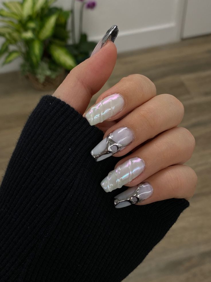 Elegant Iridescent Nail Design: Soft Pastels, Chrome Accents, and Sophisticated Decor.