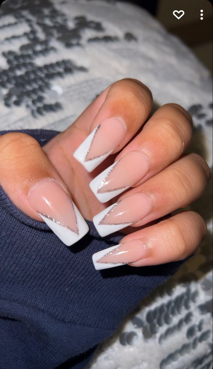 Elegant Chic Nail Design with Elongated French Tips and Glamorous Silver Accents