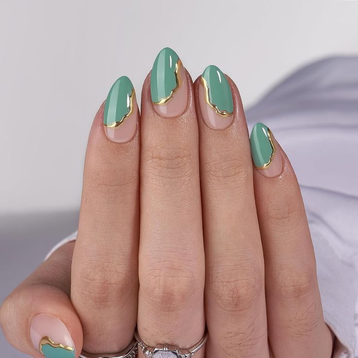 Chic Green and Gold Nail Design: A Sophisticated Twist on Tradition