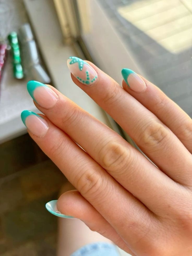 Elegant Turquoise and Nude Almond-Shaped Nail Design with Playful Teal Swirl Accent.