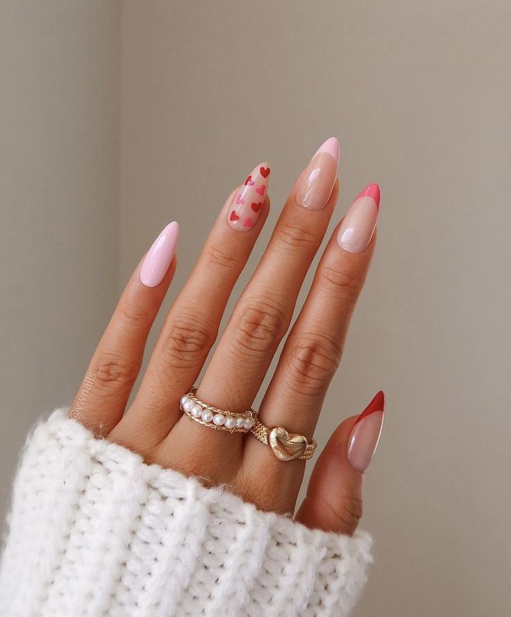 Chic Manicure: Playful Hearts and Elegant Rings in Pastel Pinks and Nudes.