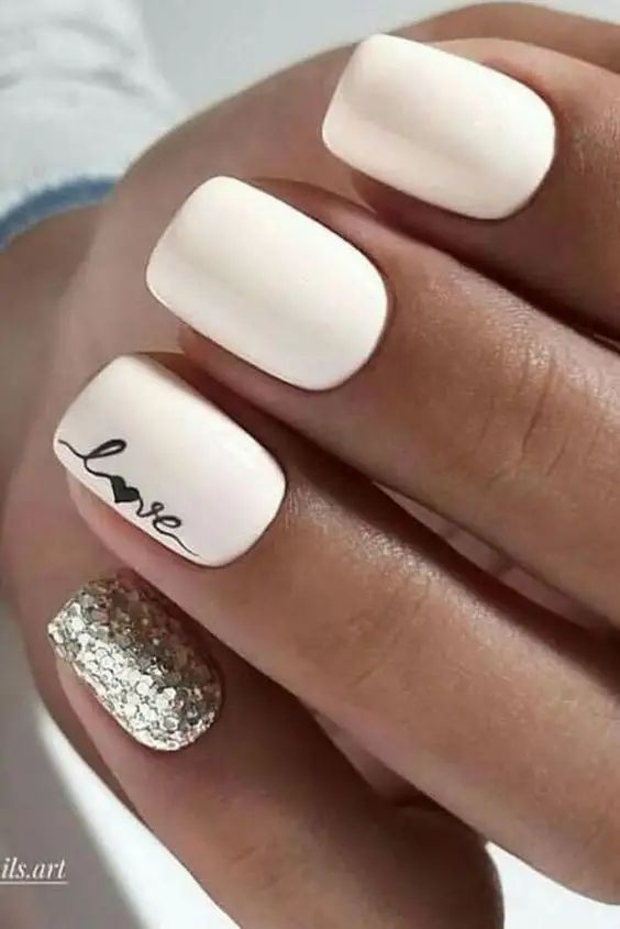 Chic Romantic Nail Design with Creamy Matte Finish and Glamorous Gold Accent.