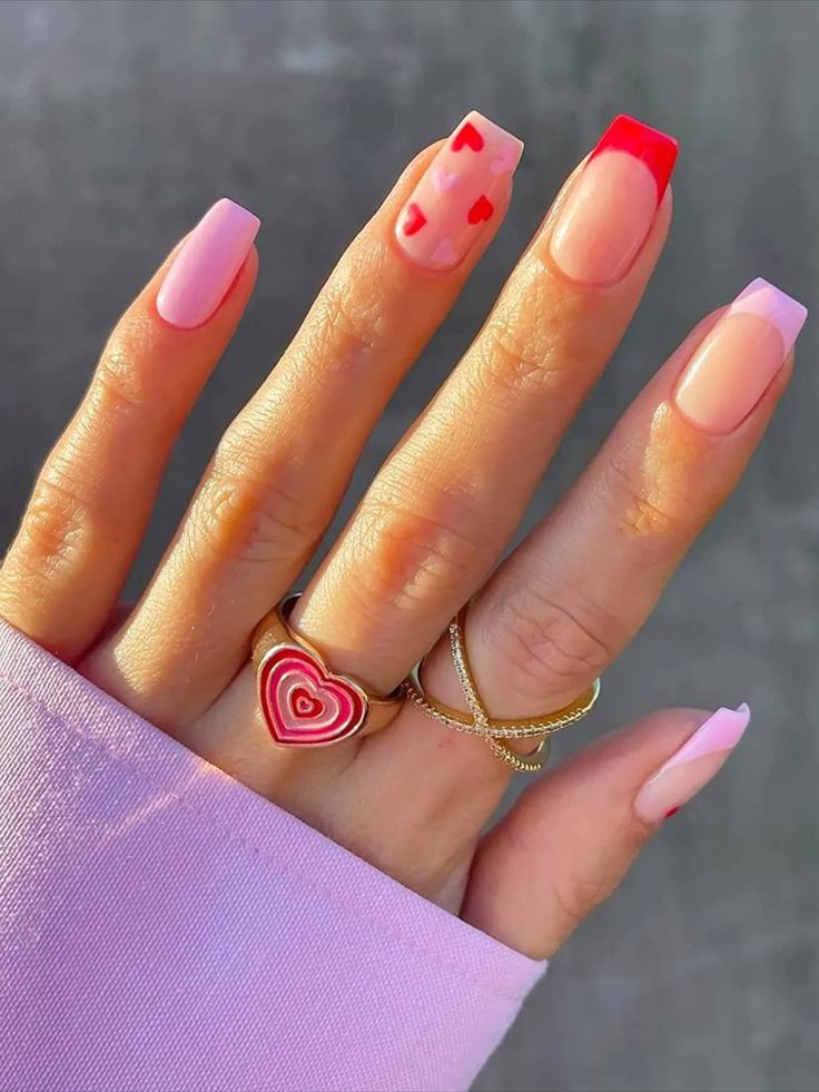 Playful Romantic Nail Design with Soft Pink and Bold Red Accents.