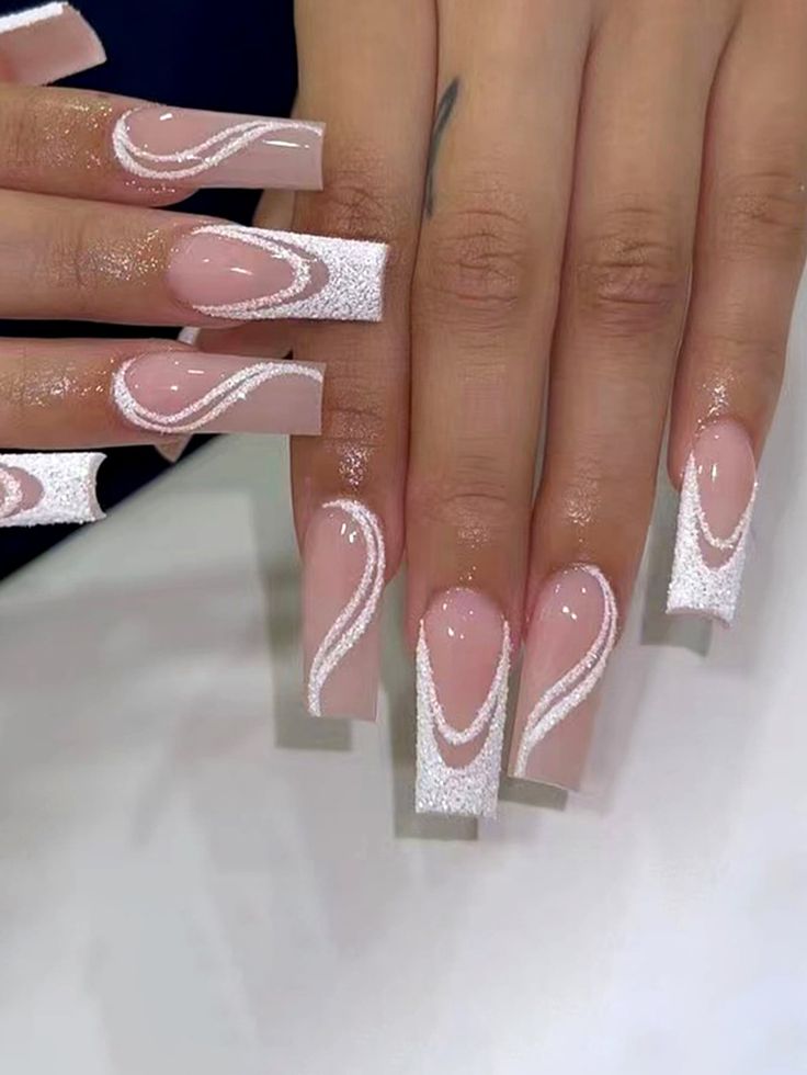 Elegant Long Square Nails with Soft Pink Base and Shimmering White Accents.