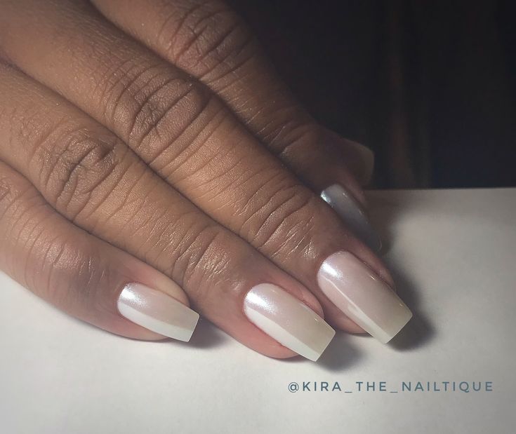 Sophisticated Nude Ombre Nails with Metallic Accent and Modern Squared Tips.