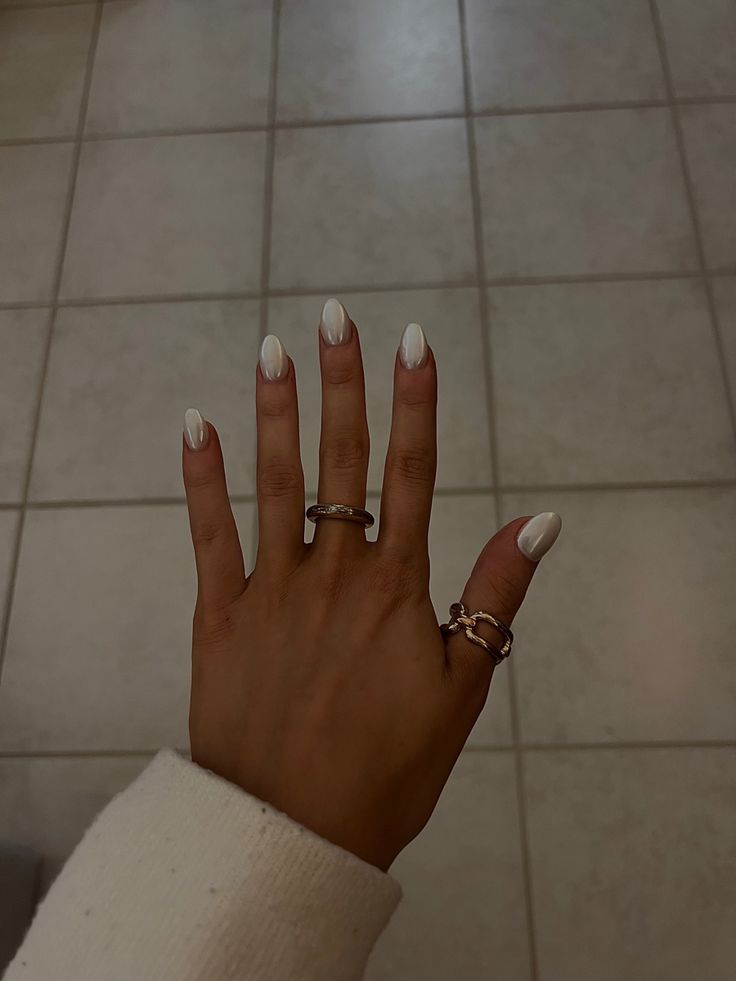 Chic Minimalist White Almond Nails: A Blend of Elegance and Versatility.