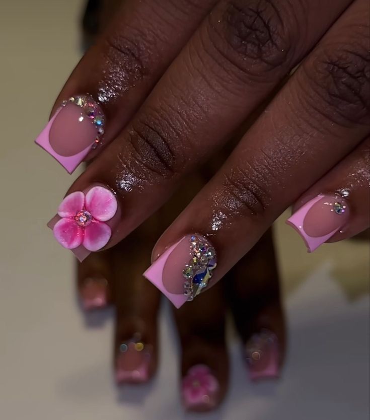 Sophisticated Pink Nail Design with Glossy and Matte Finish, Flower Motif, and Rhinestone Accents