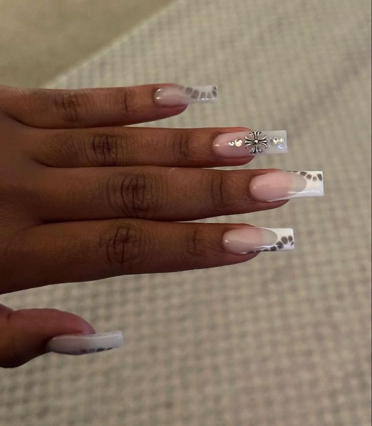 Classy Long Nails with Soft Pink, White Tones, and Glamorous Rhinestone Accents.