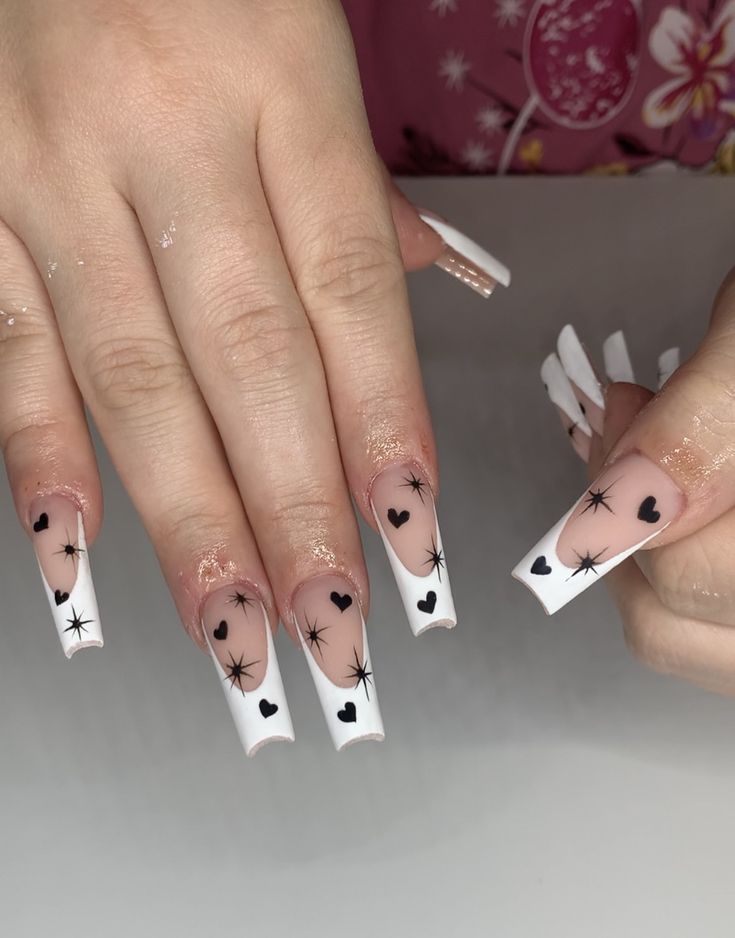 Chic White and Clear Acrylic Nail Design with Elegant Heart and Star Patterns