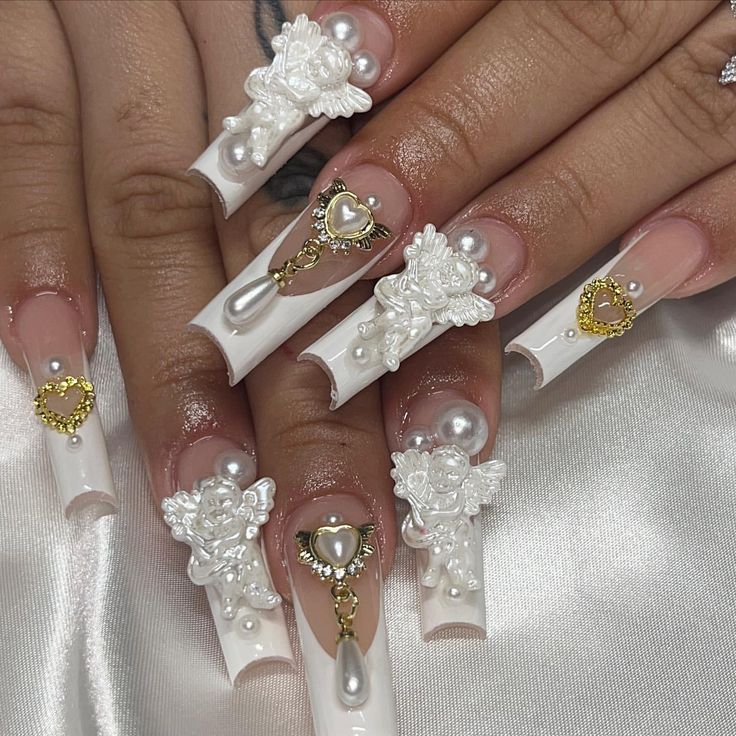 Luxurious 3D-Embellished White Coffin Nails: A Romantic and Sophisticated Design.