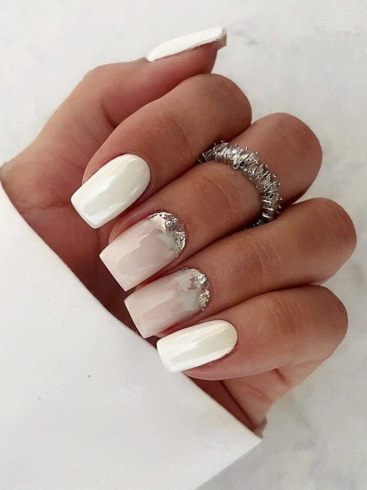 Chic Elegant Nail Design: Solid White and Soft Gradient with Shimmering Silver Accents