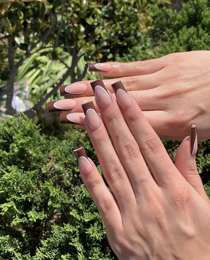 Sophisticated Nail Design: Blending Soft Nude and Rich Chocolate for a Contemporary Twist on Classic French Tips.