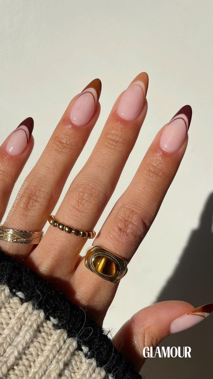 Chic Almond-Shaped Nails with Warm Gradient and Elegant Gold Accents