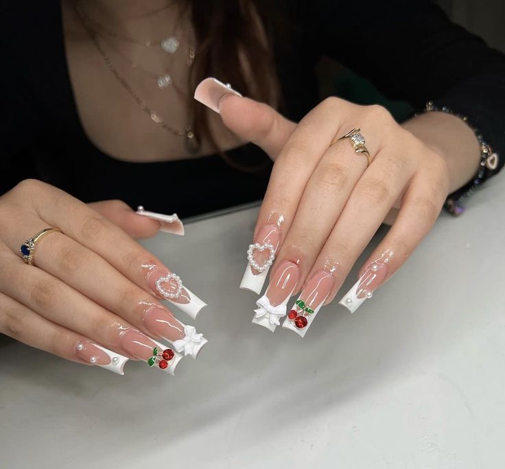 Whimsical 3D Nail Design with Charming Motifs and Sparkling Accents