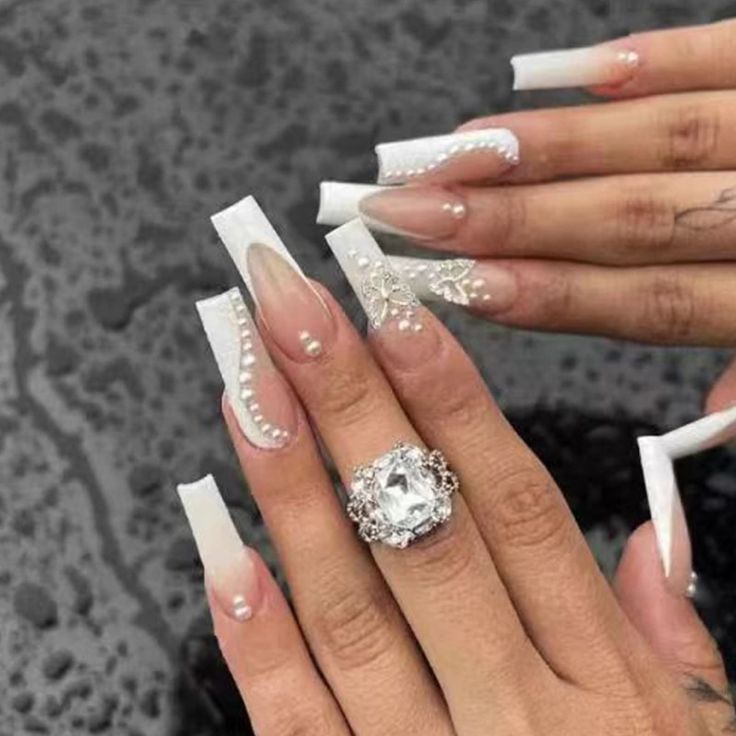 Sophisticated Long Acrylic Nails with Pearl and Lace Designs in Clear and White Palette