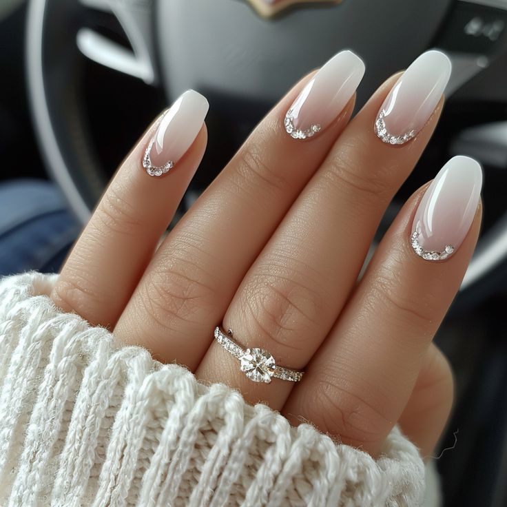 Elegant Ombre Nails with Sparkling Accents: A Chic and Sophisticated Look.