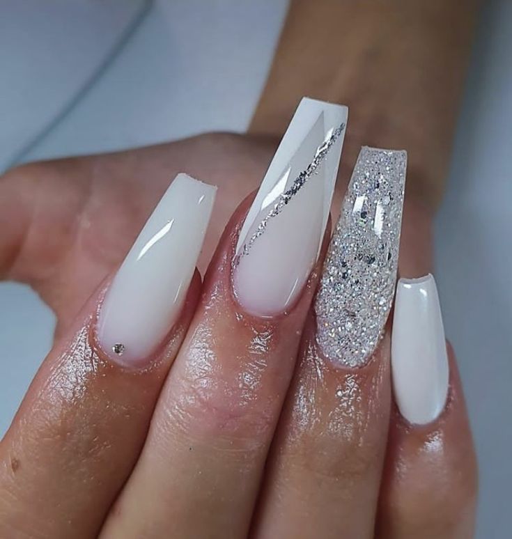 Chic Nail Design: Glossy White and Glittering Silver for Sophisticated Glamour.