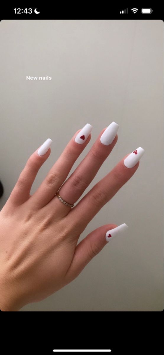 Charming White and Red Heart Nail Design with Modern Square Tips.