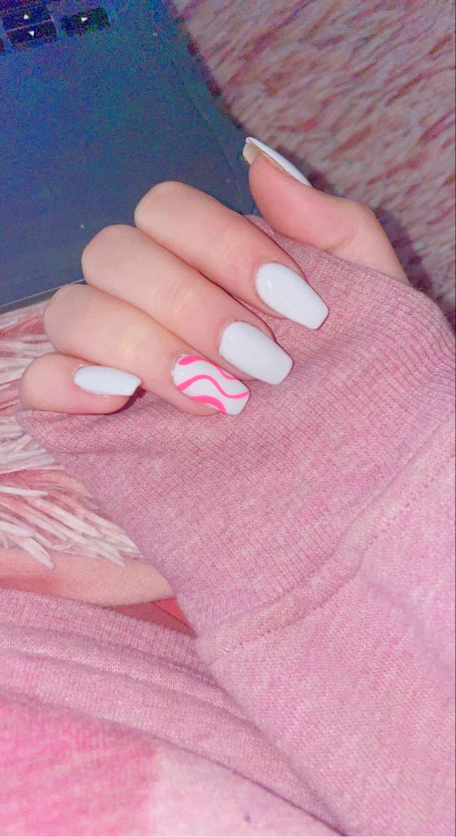 Elegant Long Nails with Soft White Polish and Playful Pink Waves for a Contemporary Aesthetic.