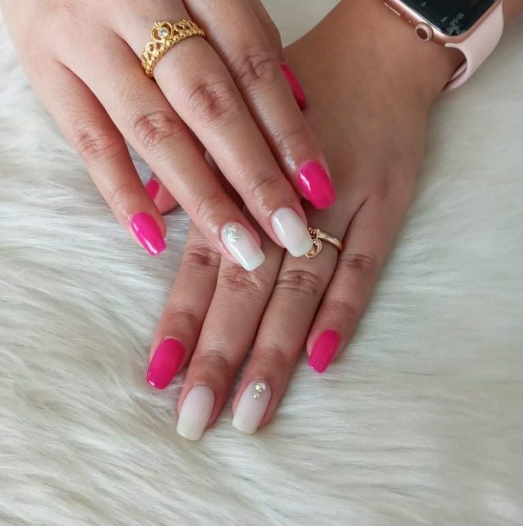 Chic Nail Design: Playful Pink and Soft White with Elegant Gem Accents