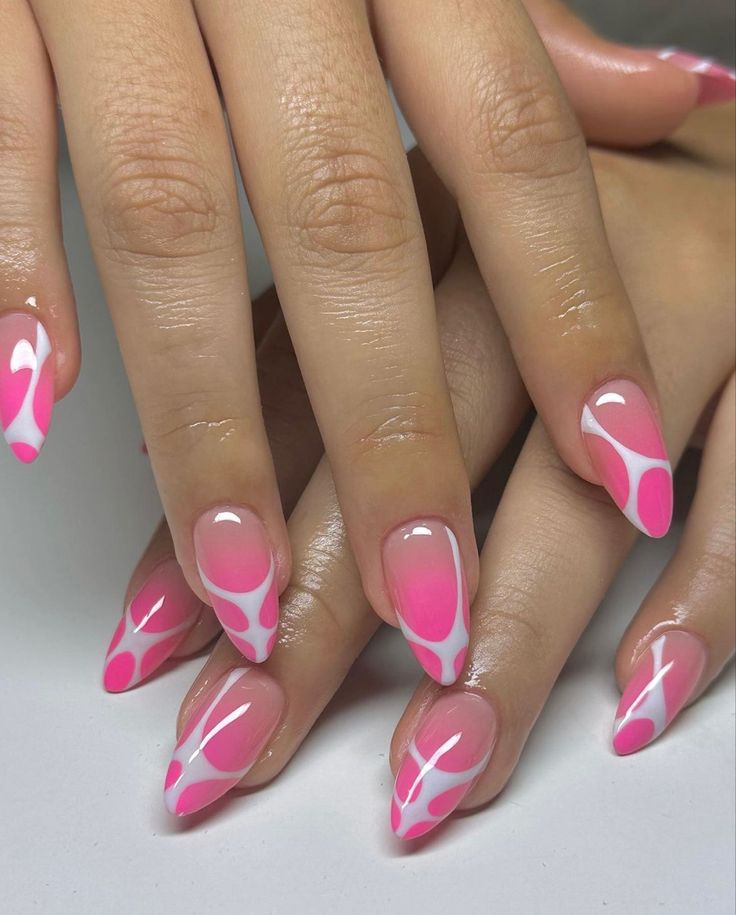 Bold Ombre Pink Nail Design with Playful White Swirls