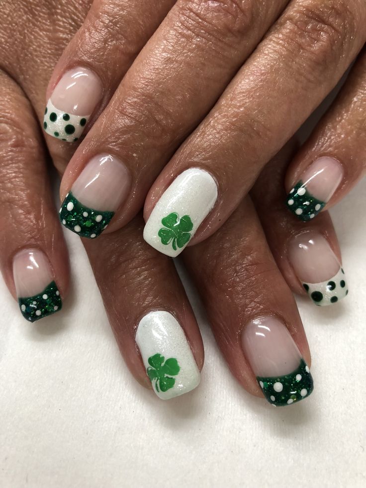 Festive St. Patrick's Day Nail Design with Green and White Polka Dots and Shamrocks