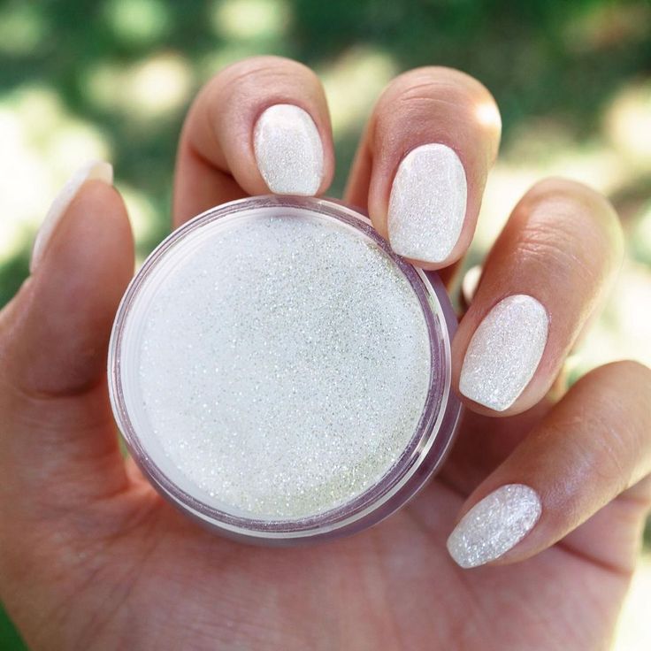 Chic and Modern: Iridescent Glittery White Nails for Creative Elegance.